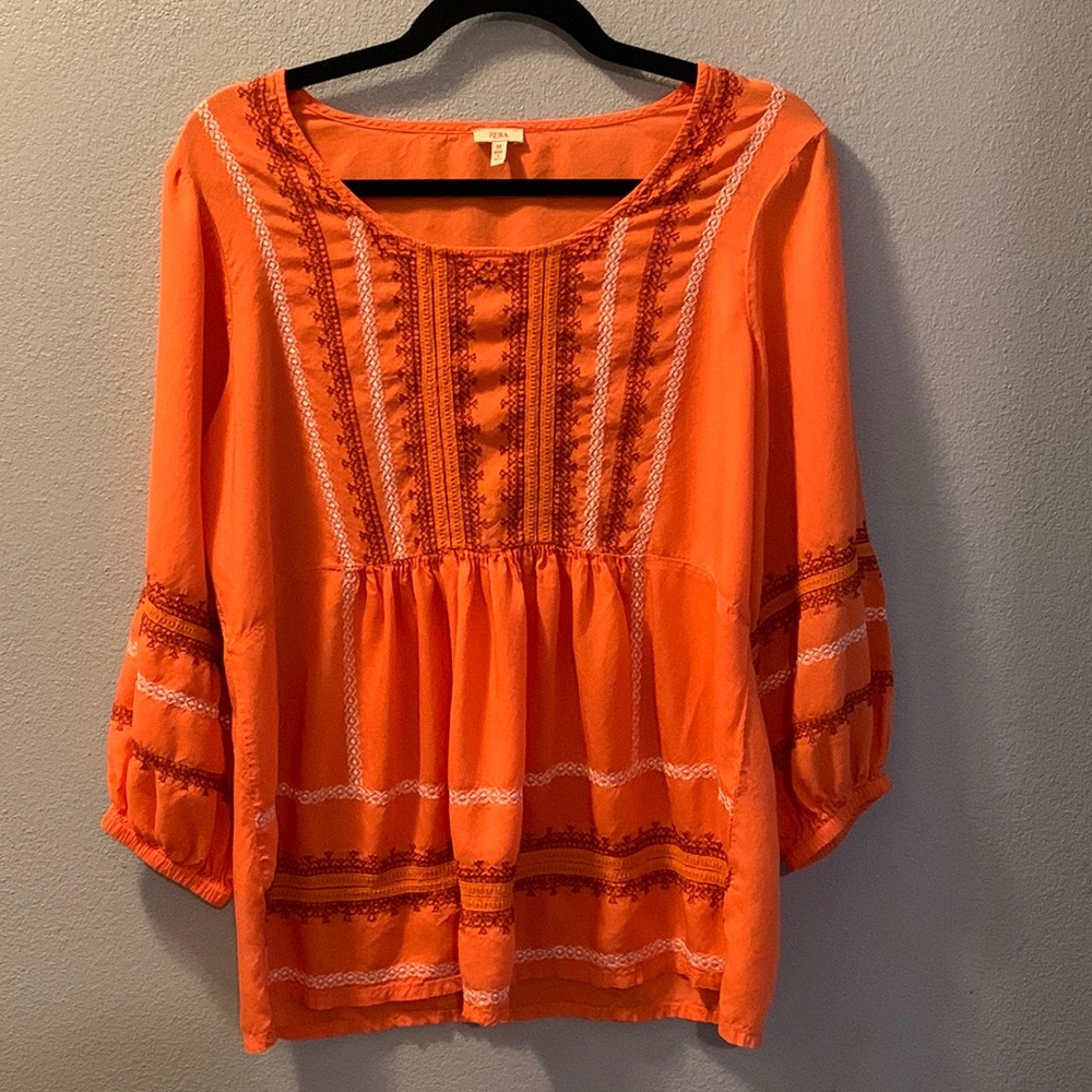 A fabulous orange Boho top